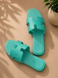 Hermès Oran Slide Sandal in turquoise Epsom calfskin leather pair