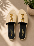 Saint Laurent Triomphe Slide in cream patent leather with gold YSL monogram hardware