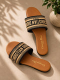 Christian Dior Dway Slide sandal in black and gold embroidered canvas