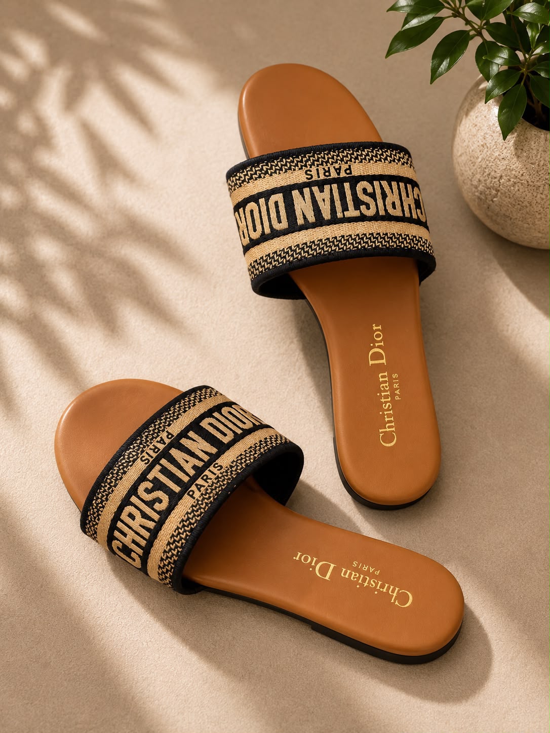 Christian Dior Dway Slide sandal in black and gold embroidered canvas