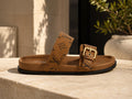 Louis Vuitton Waterfall Slide in brown monogram canvas with oversized gold square buckle
